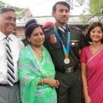 Rajyavardhan Singh Rathore with his parents and wife