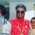 Jazzy B with his parents
