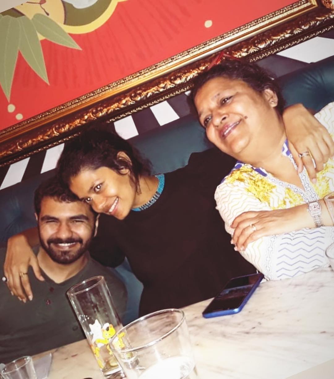 Palomi Ghosh with her brother and mother